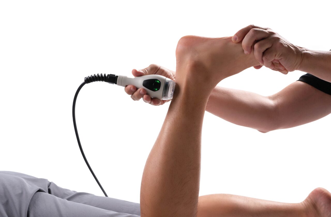 A patient receiving MLS® low level laser therapy for chronic plantar fasciitis.